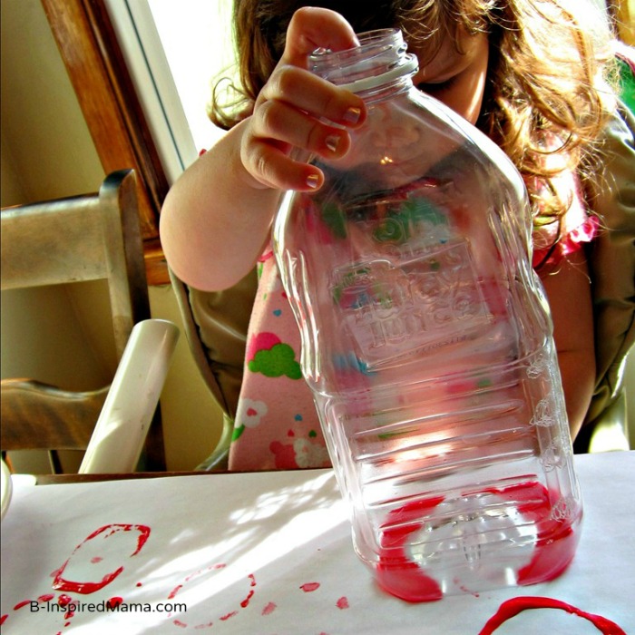 Exploring Shapes with Plastic Bottle Print Painting at B-InspiredMama.com