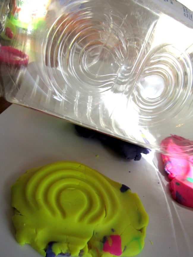 Play Dough Impressions with Plastic Bottles from B-InspiredMama.com