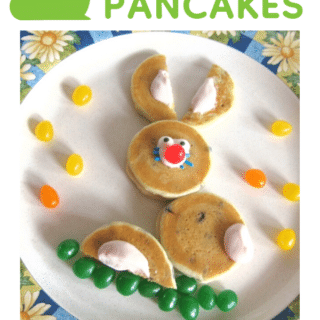 A photo of Easter Bunny Pancakes made EASY using frozen mini pancakes, strawberry yogurt, candy eyeballs, and jelly beans.