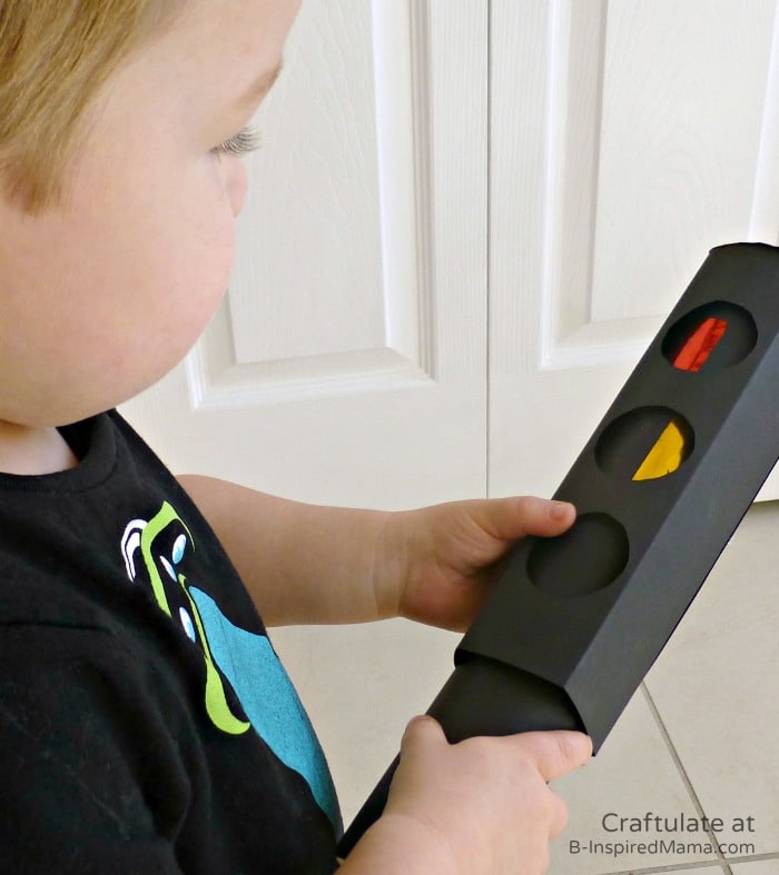 Playing with a DIY Toy Traffic Light from Craftulate at B-Inspired Mama