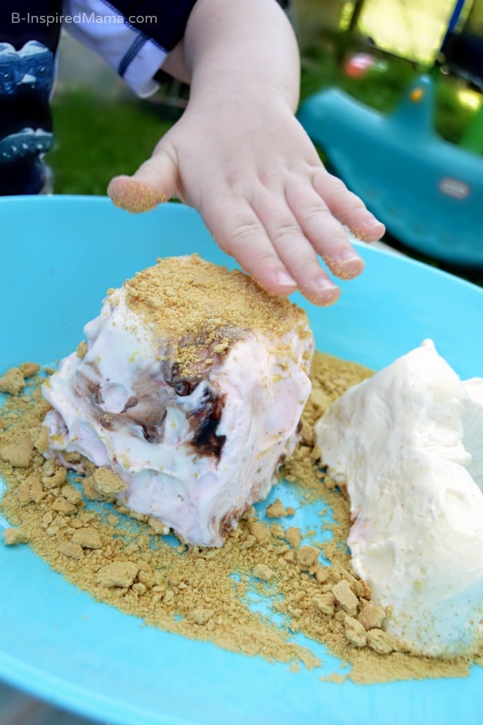 Adding Sand to Our Giant Ice Cream Sundae Sand Castle - B-Inspired Mama