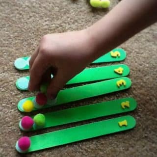 Learning Counting with a DIY Counting Sticks Busy Bag at B-Inspired Mama