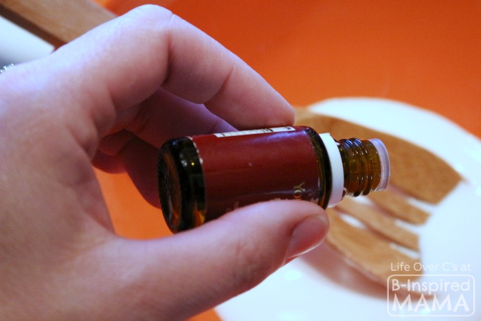 Adding Essential Oils to a Sick Day Slime Recipe at B-Inspired Mama