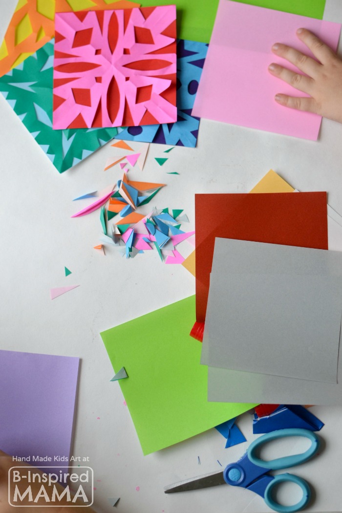 Making a Colorful Kids Art Quilt with Paper Snowflakes - B-Inspired Mama