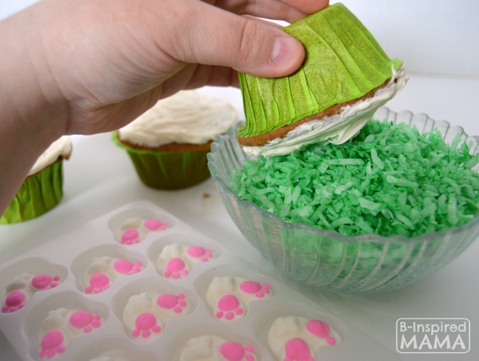 Icing and Decorating Bunny Nutt Easter Cupcakes - A Kids in the Kitchen Recipe at B-Inspired Mama