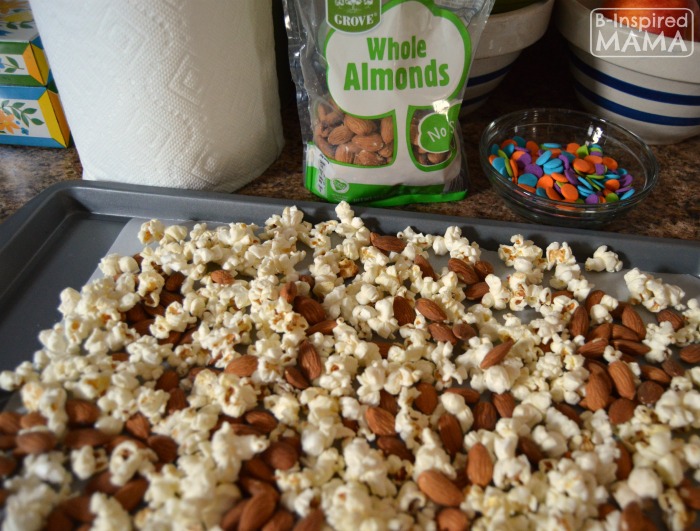 Making Some Neon Slime Popcorn Snack Mix for Watching the Nickelodeon Kids Choice Awards at B-Inspired Mama