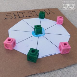 A photo of a DIY Shisima game, a cool multicultural math game from Kenya for kids.