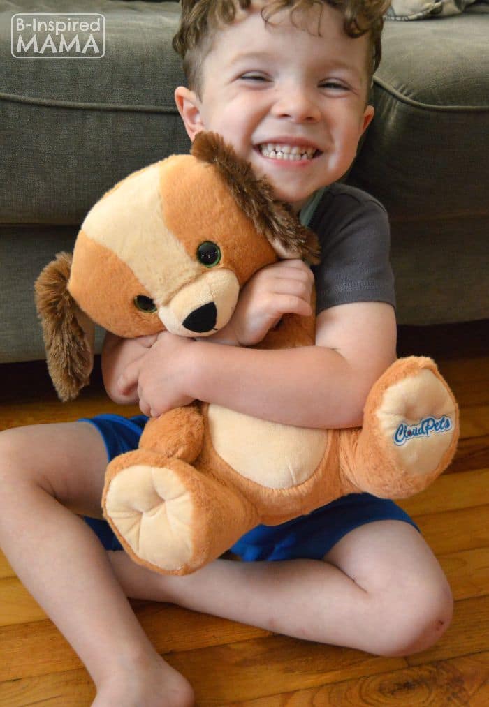 Keeping Your Blended Family Close - Even While Apart - J.C. hugging his New CloudPet - B-Inspired Mama