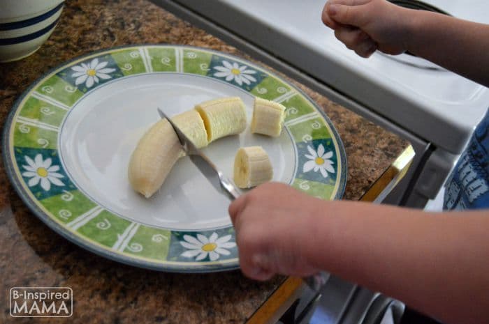 J.C. Cutting Bananas for our Ice Cream Banana Pudding - B-Inspired Mama