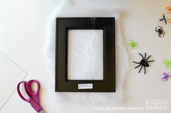 Spider Web Picture Frame Halloween Craft - Adding the Spider Web - B-Inspired Mama