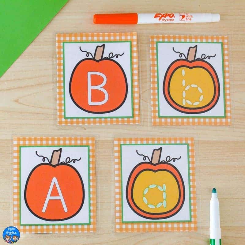 A free fall preschool printable learning activity using a pumpkin and pumpkin seeds theme for practicing letters and handwriting.