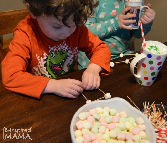 JC and Priscilla Making Marshmallow Sculptures and Drinking their Hot Chocolate - at B-Inspired Mama