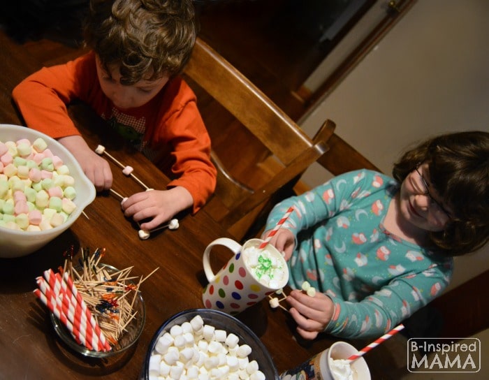 JC and Priscilla Making Marshmallow Sculptures while they Enjoy their Hot Chocolate - at B-Inspired Mama