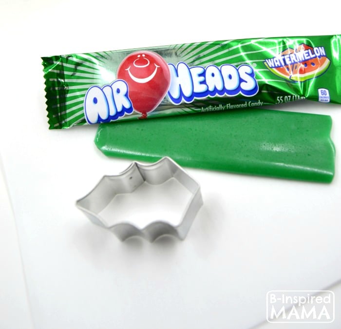 Make a Holly Cupcake Topper for Christmas Cupcakes - Using Watermelon Airheads - at B-Inspired Mama
