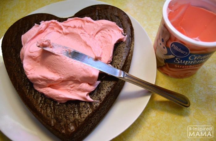 Making Dark Chocolate Strawberry Brownies for Your Valentine - Adding Strawberry Frosting - B-Inspired Mama