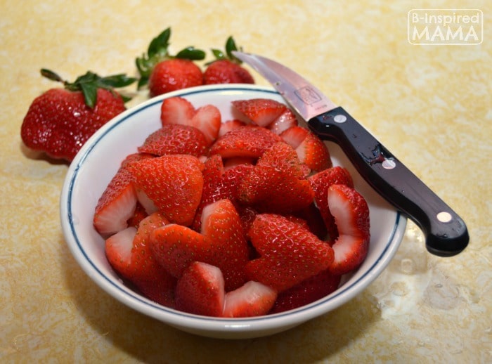 Making Dark Chocolate Strawberry Brownies for Your Valentine - Cutting Heart Shaped Strawberries - B-Inspired Mama