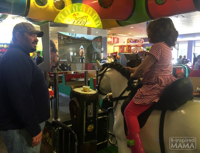 9 Tricks for a Stress-Free Chuck E Cheese's Trip - Playing While Waiting for our Pizza - at B-Inspired Mama