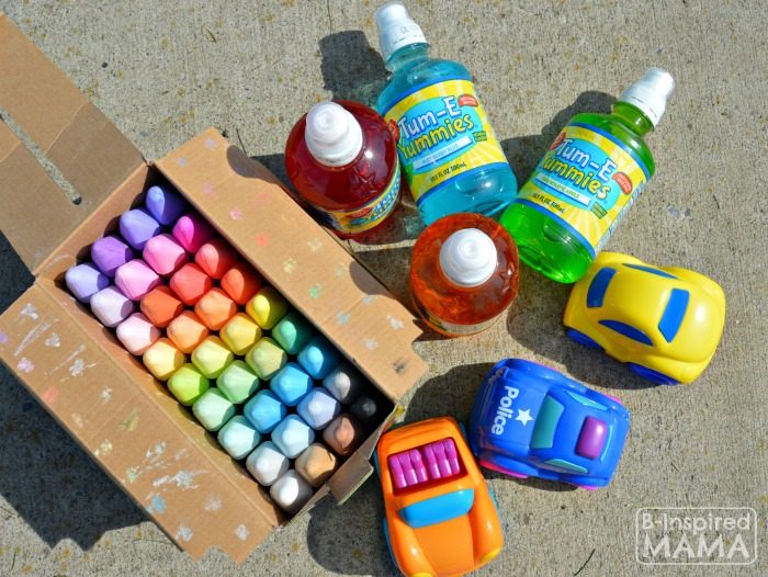 A photo of supplies for a simple sidewalk chalk art for kids to play cards on.