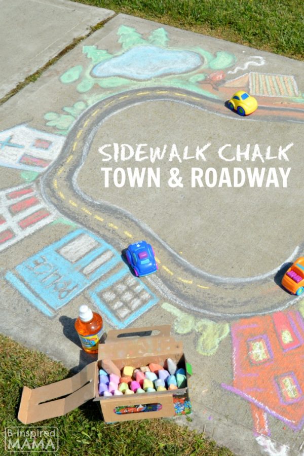 A photo of a giant chalk town and road — simple sidewalk chalk art for kids to play cards in!