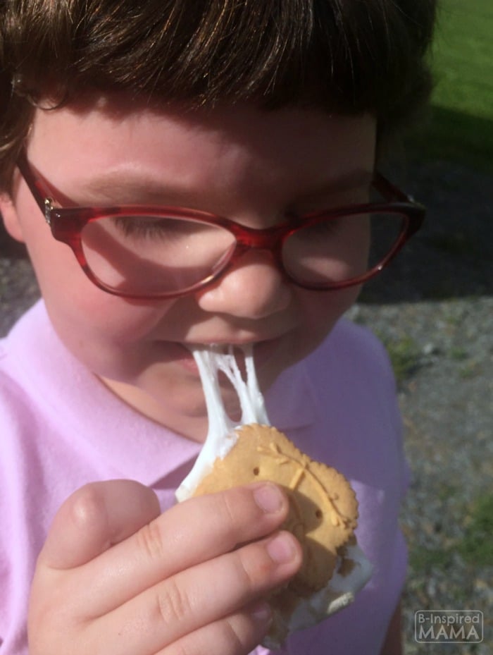Delicious Maple Creme Cookie S'Mores + Sweet Summer Memories Camping - Priscilla enjoying her Fancy S'More - at B-Inspired Mama