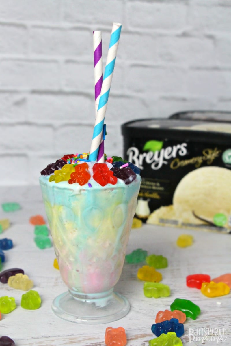 A super easy and seriously fun Rainbow Gummy Bear Milkshake Recipe - Make the kids smile this summer with a colorful and delicious milkshake - at B-Inspired Mama