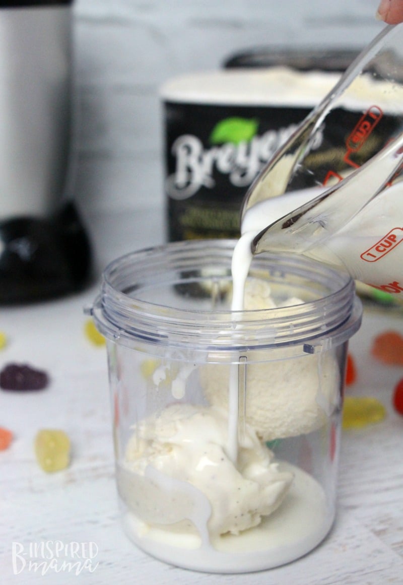 A super easy and seriously fun Rainbow Gummy Bear Milkshake Recipe - rich and creamy milk - at B-Inspired Mama