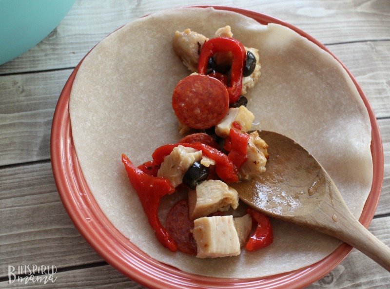 An Easy Italian Antipasto Grilled Chicken Wrap Recipe - perfect for a summer family lunch or dinner - filling up your tortilla - at B-Inspired Mama