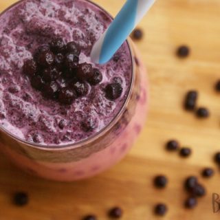 A layered and delicious Mango Razzy Berry Kids Fruit Smoothie - at B-Inspired Mama