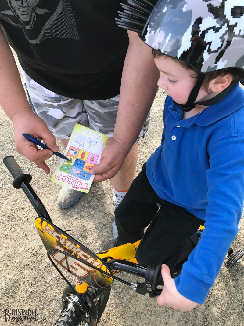 JC and his dad playing Kids Bike Bingo - Making Learning to Ride a Bike Fun