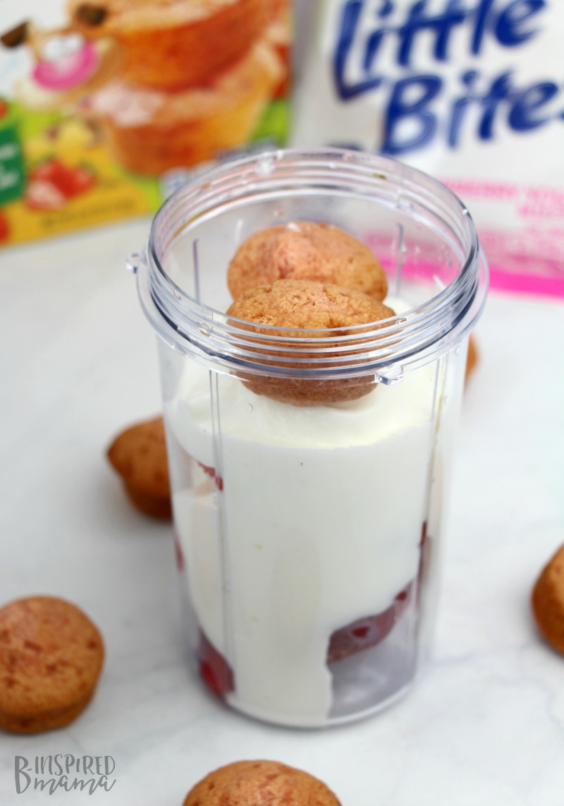 Adding muffins for our Strawberry Yogurt Muffin Kids Smoothie - at B-Inspired Mama