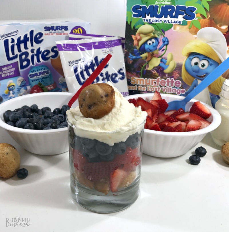 Adding our Homemade Whipped Cream to our Yummy Super Fun Smurf Blueberry Muffin Parfait Recipe