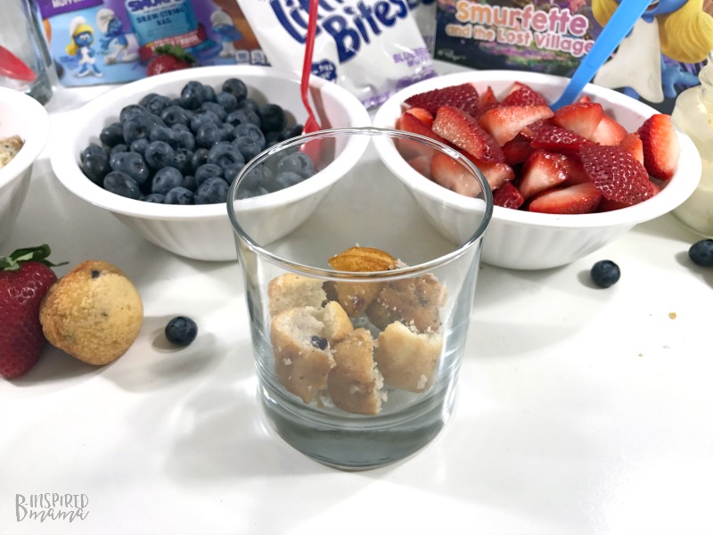 Starting with a layer of Little Bites Muffins for our Super Fun Smurf Blueberry Muffin Parfait Recipe