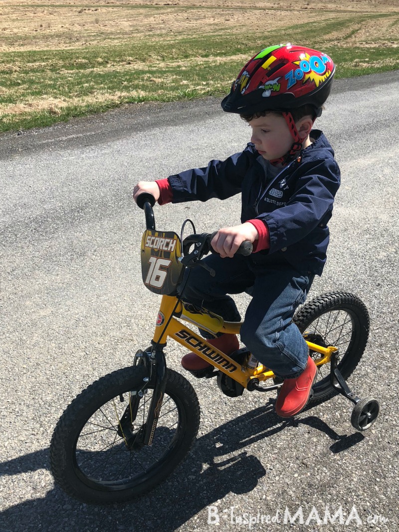 J.C. riding his awesome Schwinn SmartStart Bike + Kids Bike and Kids Bike Helmet Sizes - Made Easy