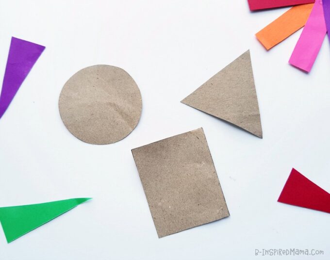 A photo of the paper shapes for a shape turkey craft for preschool kids.