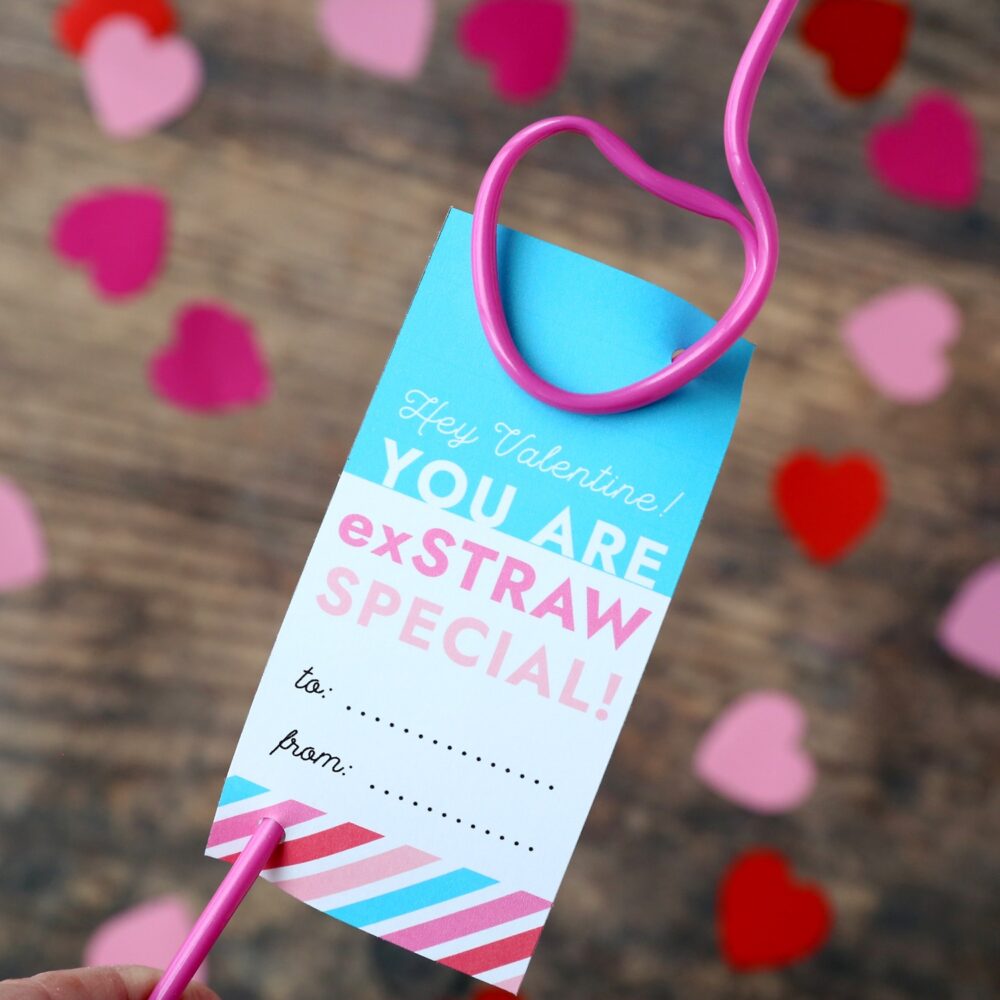 A printable silly straw Valentine for kids featuring a pink heart-shaped silly straw with a printed paper Valentine on it saying "You are exstraw special!" A great non-candy Valentine idea for kids of all ages!